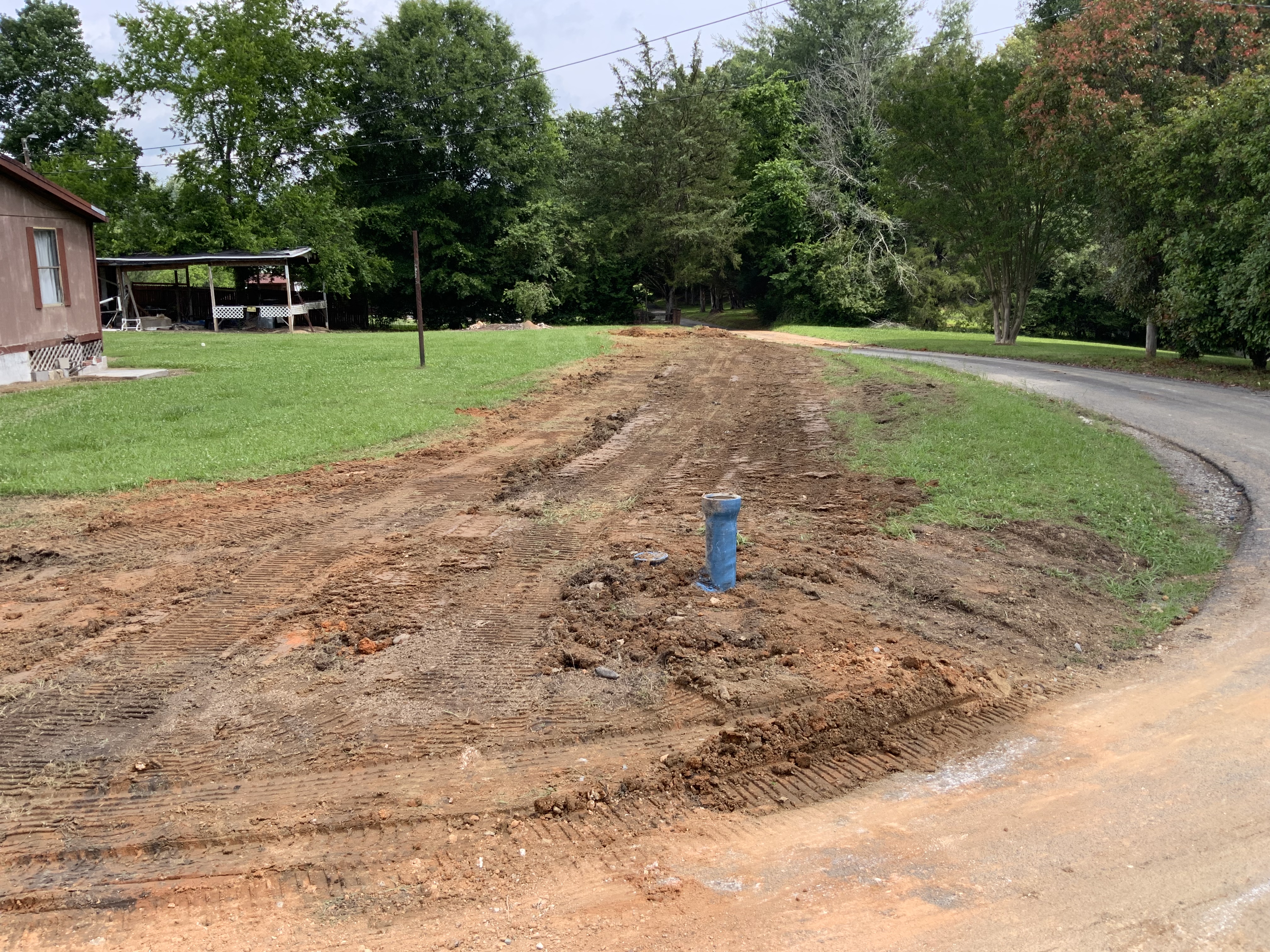 Backfilled and graded after installation